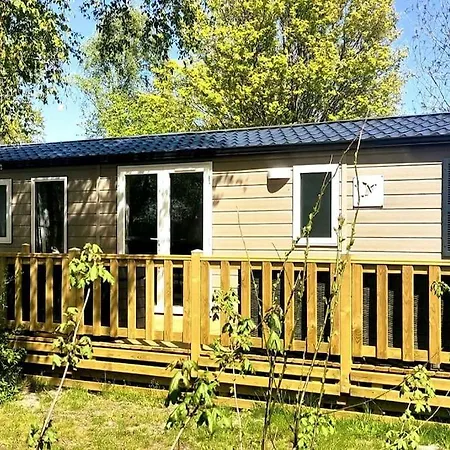 Modern Holiday Chalet On Lake Side Holiday Park Lauwersoog Exterior photo